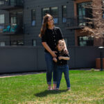 Mom and young daughter sharing a sweet moment during a spring lifestyle photo session.