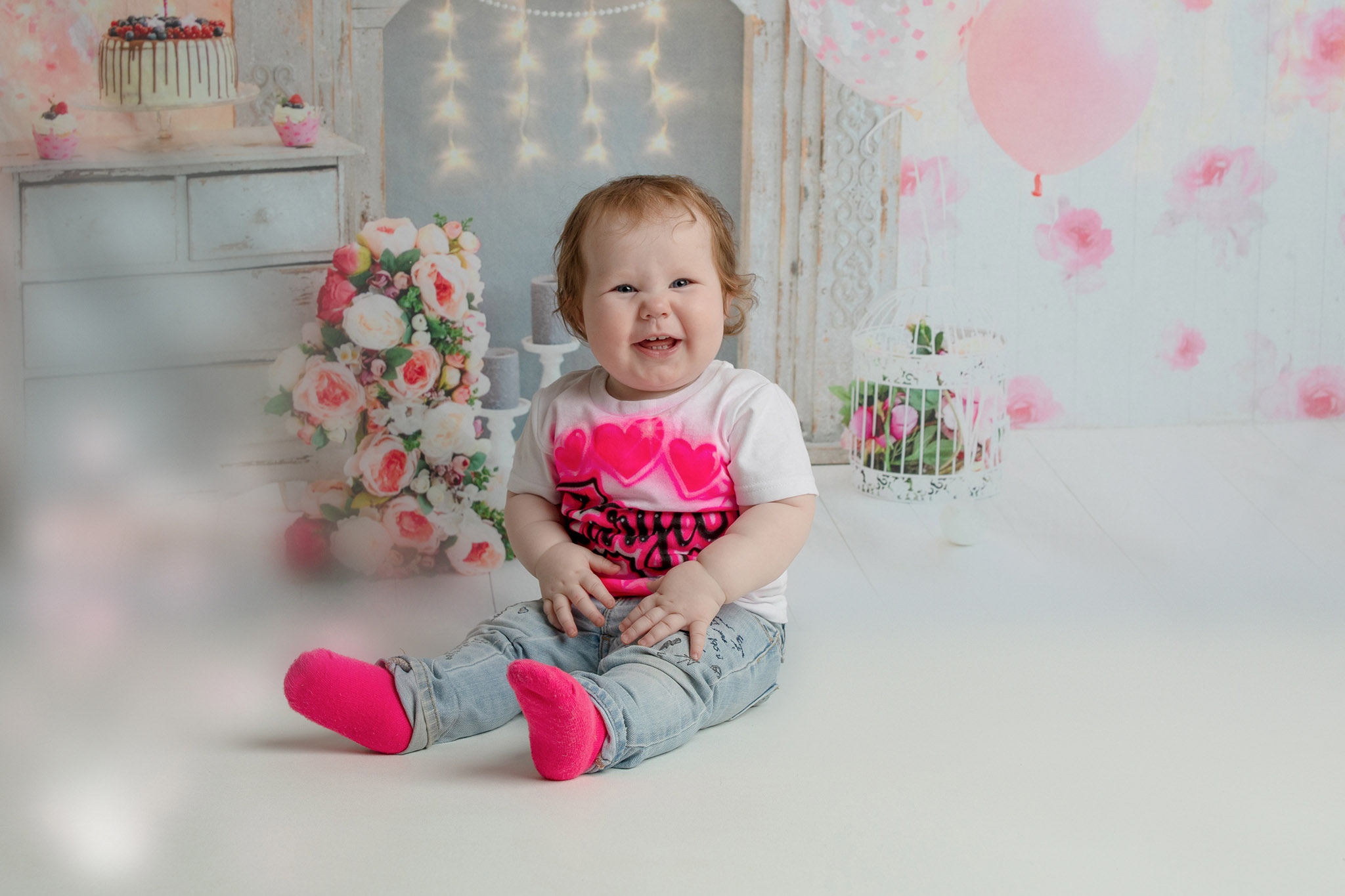 Cake smash photographer in La Crosse Wisconsin capturing first birthday portraits