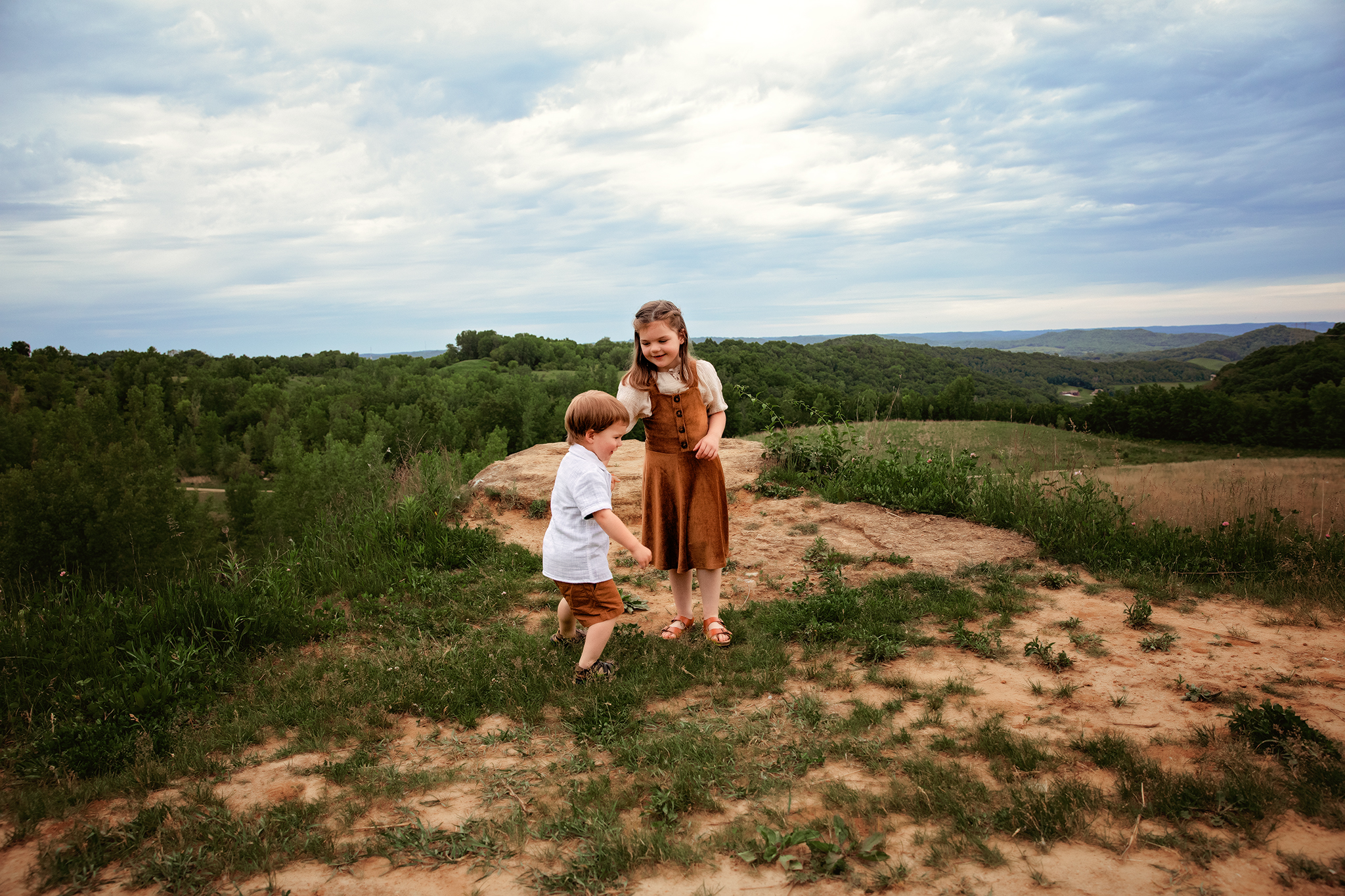 Storytelling lifestyle family photography in Wisconsin with mother and children in natural outdoor setting