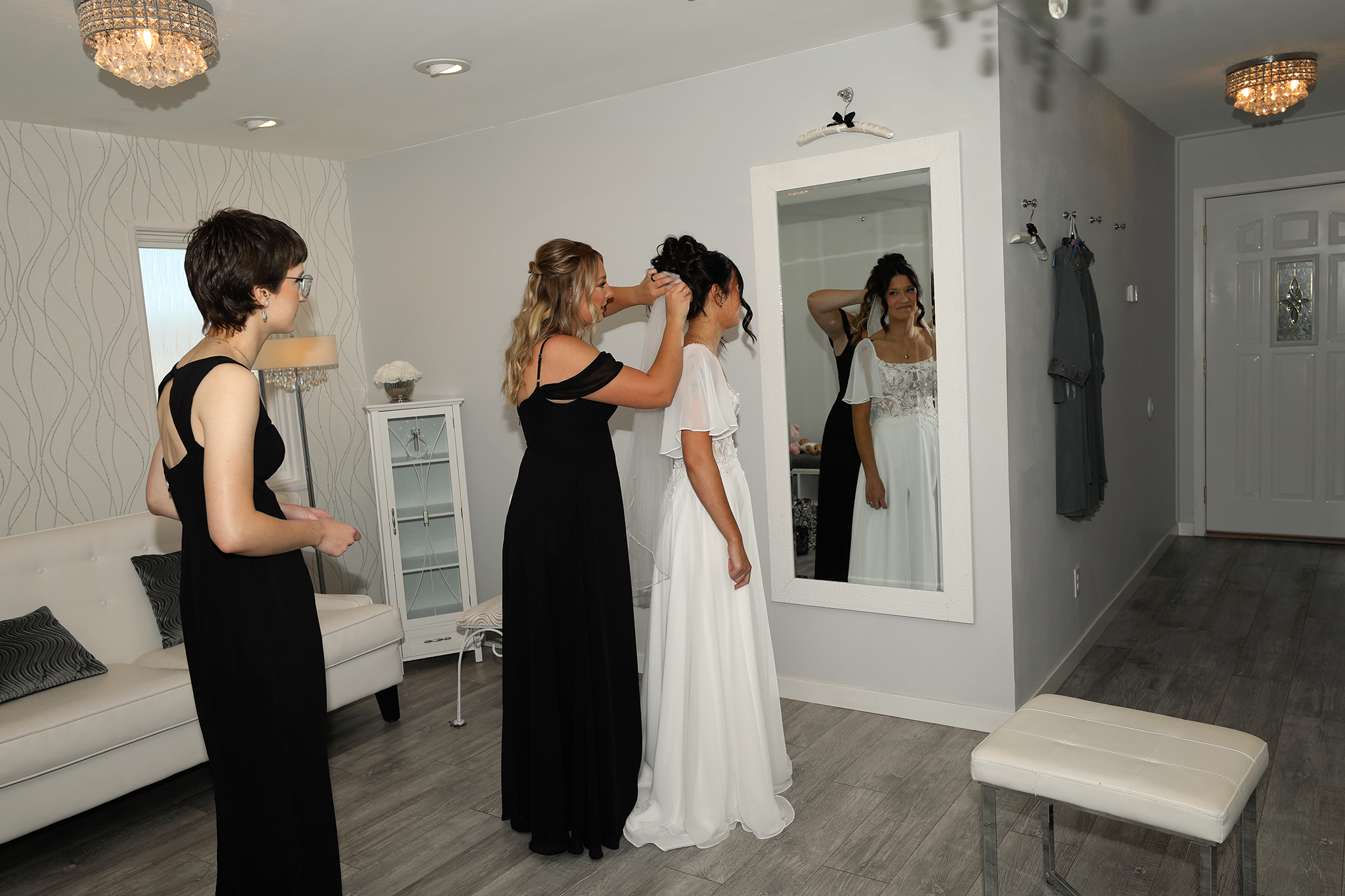 Editorial wedding photography in La Crosse Wisconsin featuring an intimate bridal preparation moment with modern storytelling style