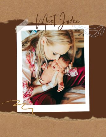 Mother holding newborn baby during Fresh 48 hospital photography session in La Crosse, Wisconsin.